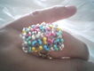 anillo tejido con canutillo checo de colores